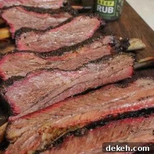 Smoked Beef Ribs with Garlic and Jalapeño 16 Smoked Garlic Jalapeño Beef Ribs sliced and ready to serve.