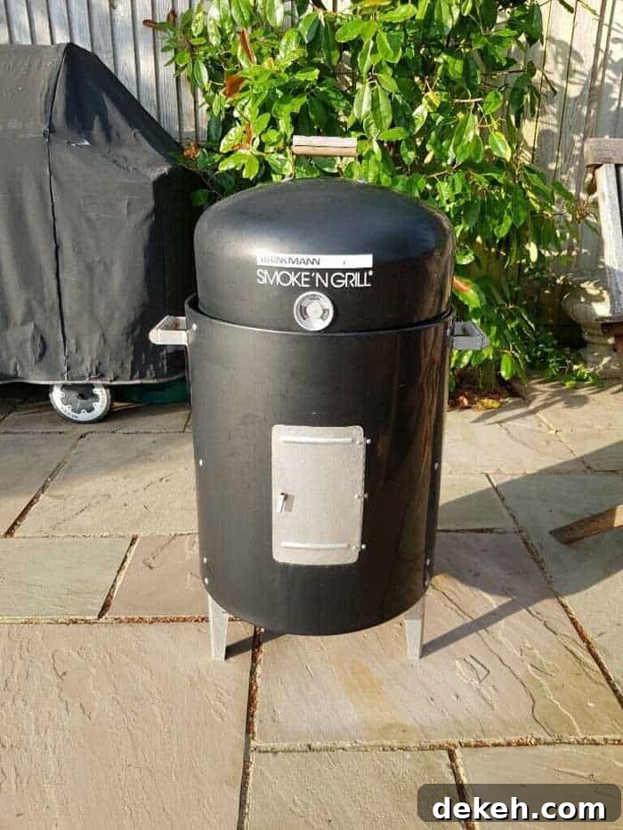 Brinkmann Smoke 'N Grill Review: Features, Performance & Value 10 brinkmann charcoal smoker on garden backyard patio
