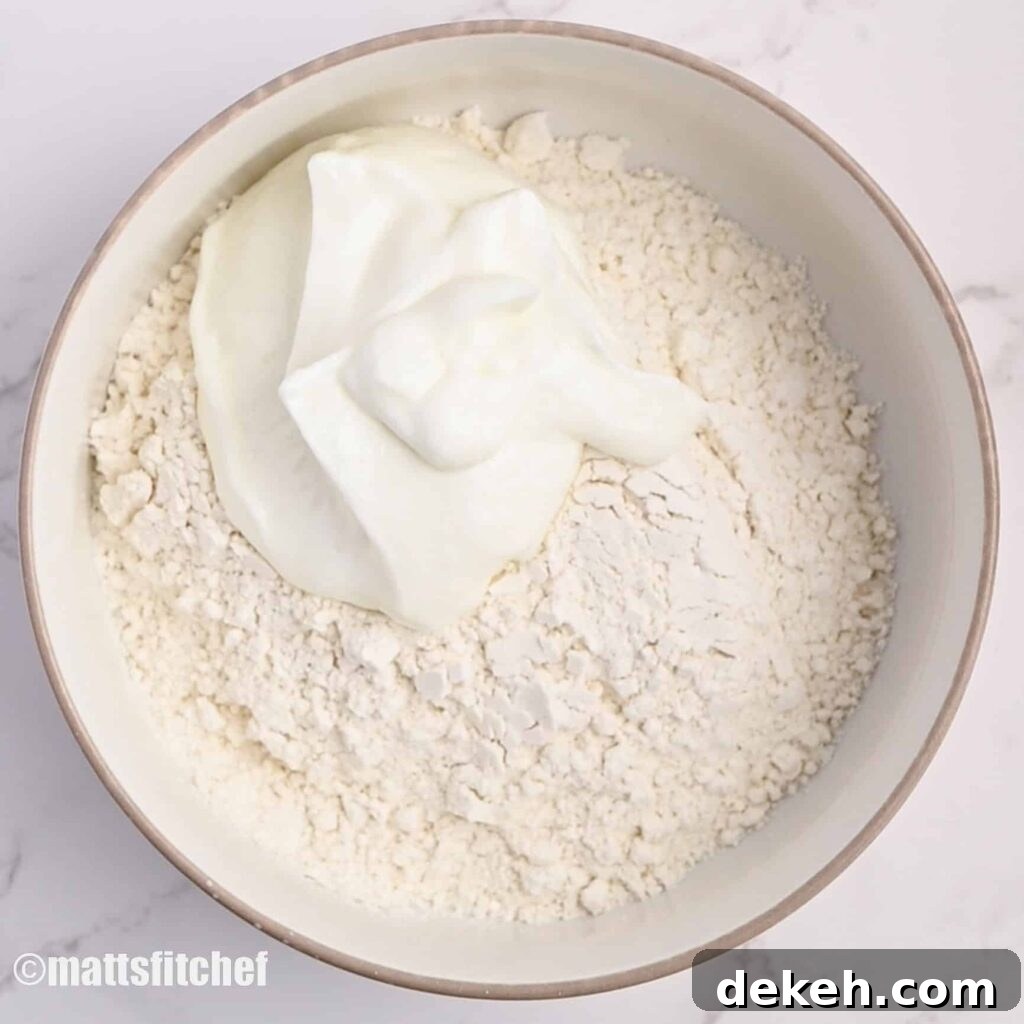 Crispy Homemade Bread in the Air Fryer 4 Adding Greek yogurt to flour and baking powder