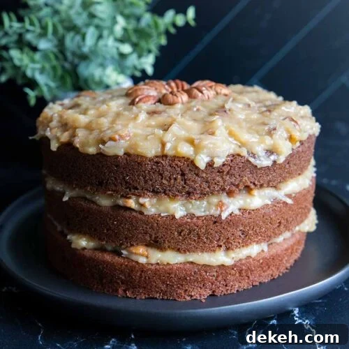 Original Baker's German Chocolate Cake Recipe 9 Baker's German Chocolate Cake on a black plate