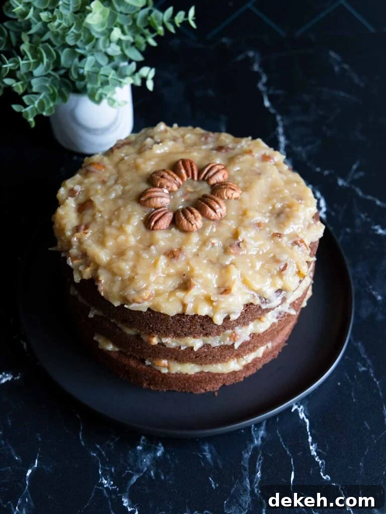 Original Baker's German Chocolate Cake Recipe 4 Original Baker's German Chocolate Cake on a black plate.