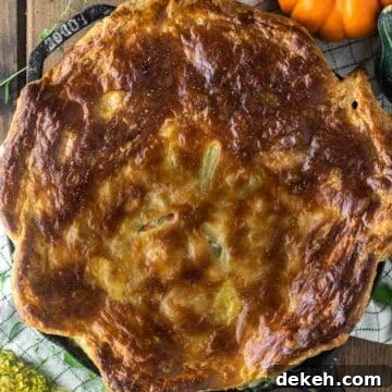 Puff pastry turkey pot pie in skillet.