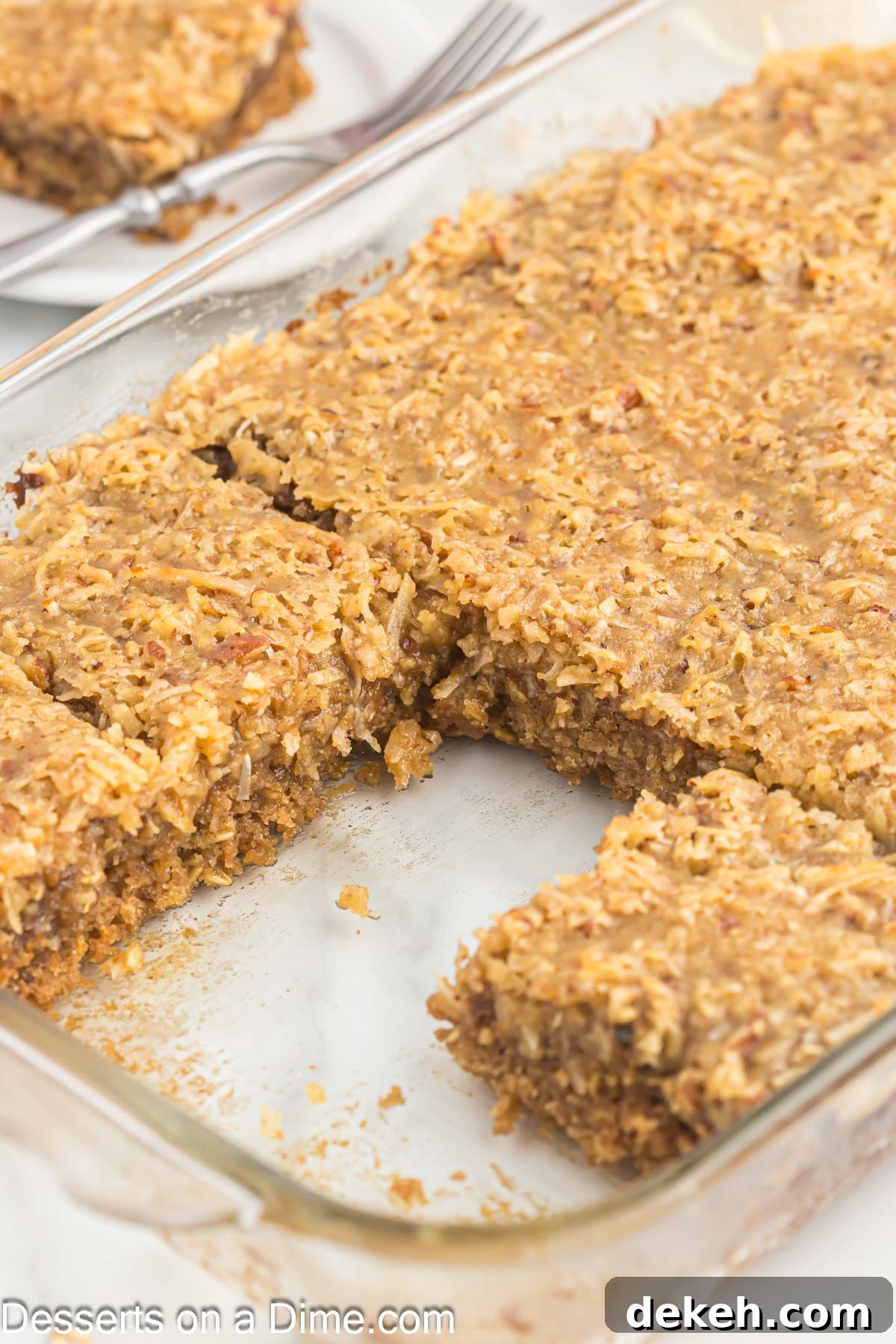 Moist Oatmeal Cake with Cinnamon Streusel 11 Cake pan with slices cut out for serving.
