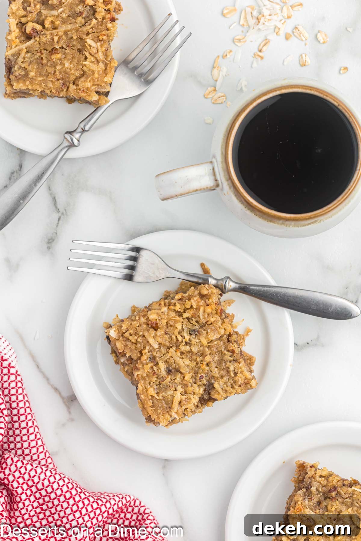 Moist Oatmeal Cake with Cinnamon Streusel 12 Slice of oatmeal cake on a plate beside a cup of coffee.